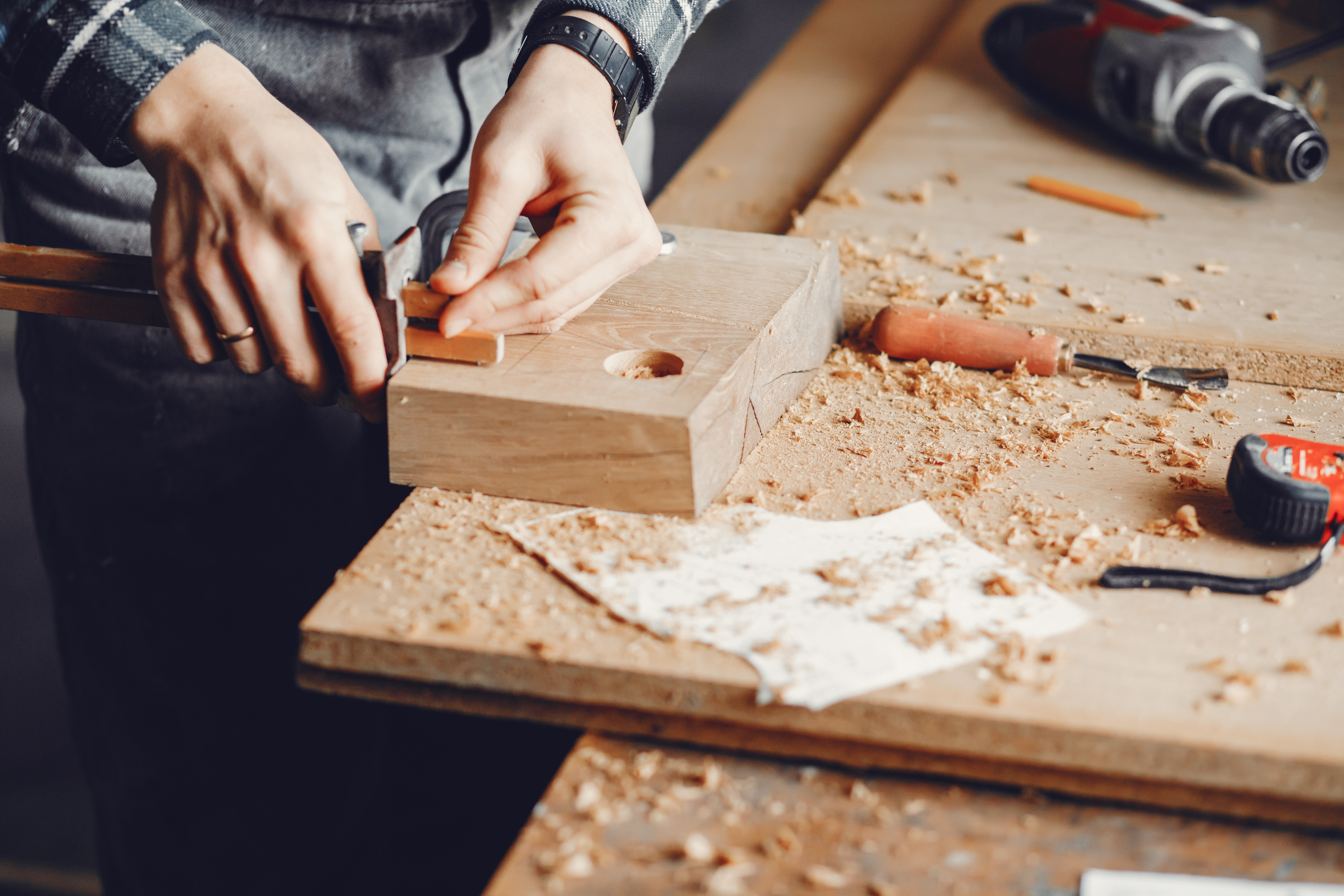 carpenter-works-with-tree.jpg